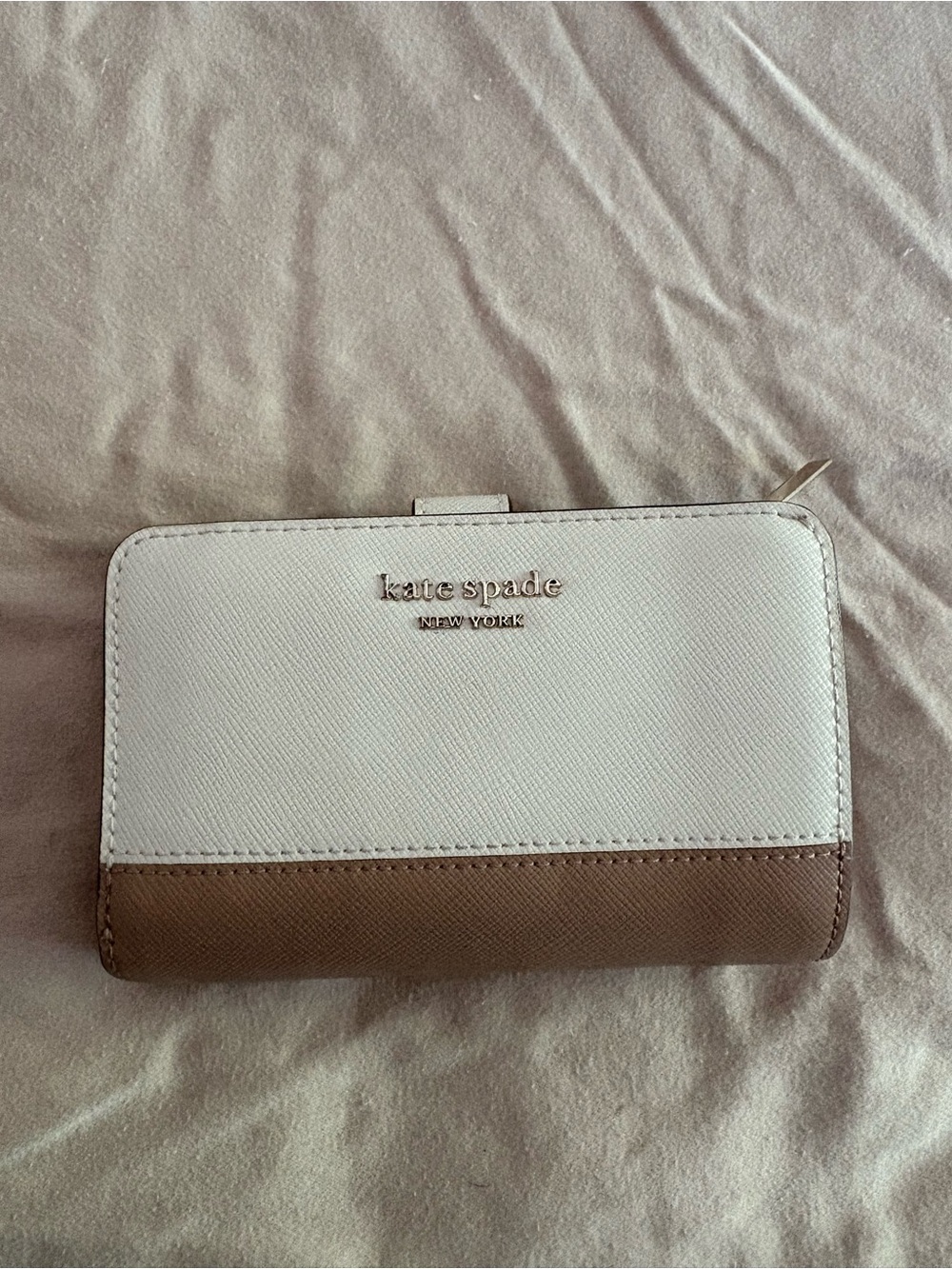 kate spade two-tone white and brown zip-around wallet